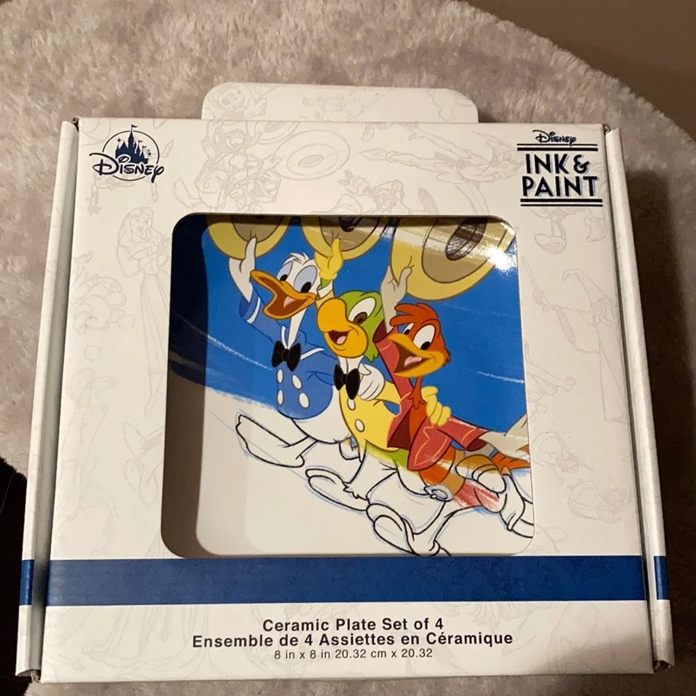 Disney ink and paint set of four plates